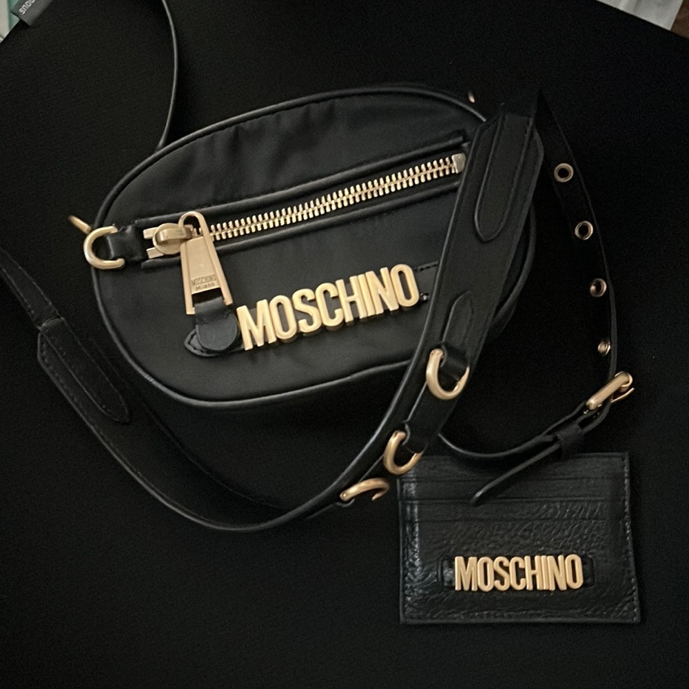 Authentic Moschino crossbody purse with matching pebble leather wallet.